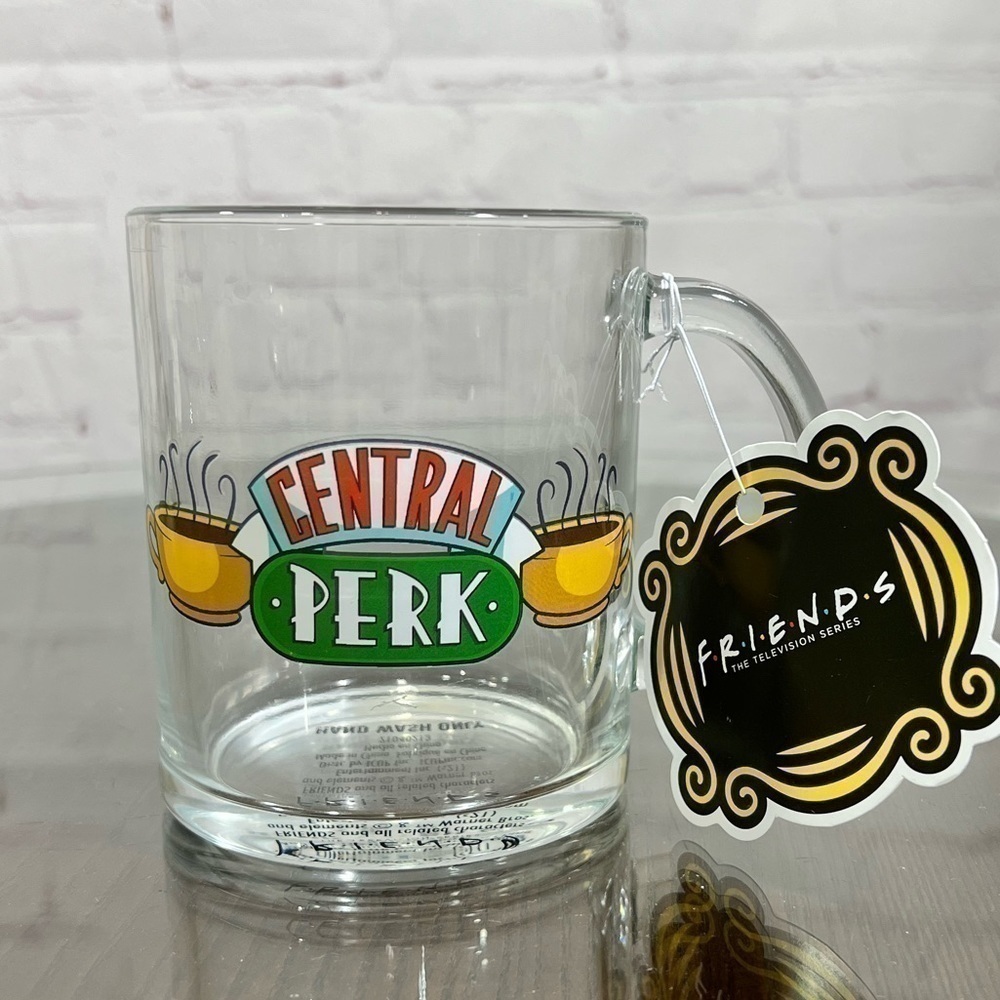 “FRIENDS” 16 oz mug with “Central Perk” logo on it.